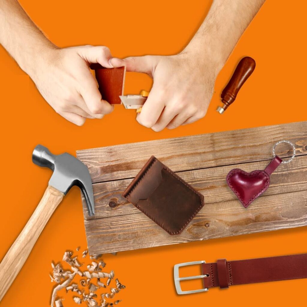 Hammer, hands working with leather tools, wallet, belt, plank of wood