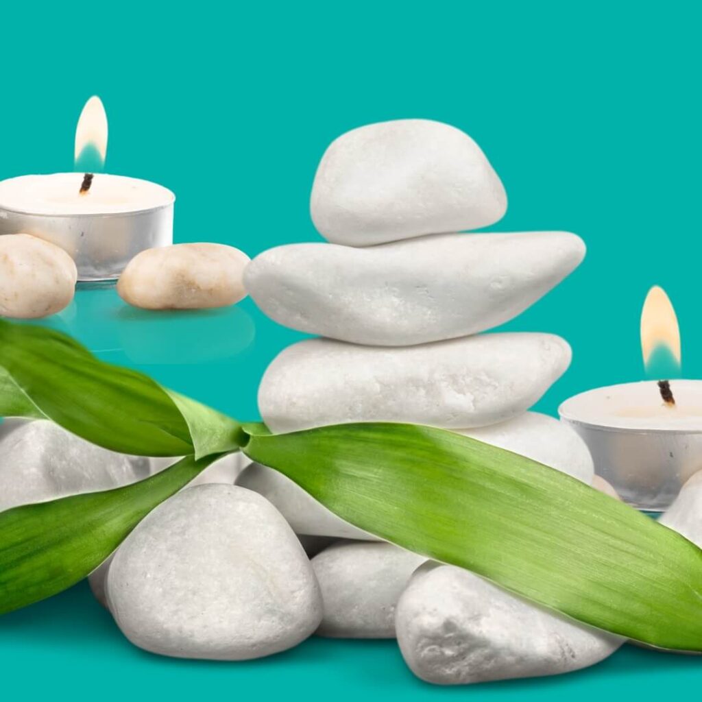 a stack of rocks and candles