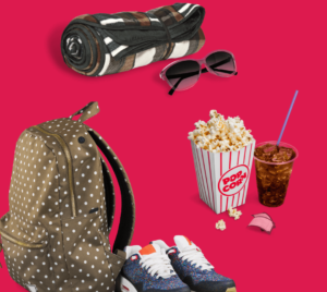 Backpack, shoes, popcorn, movie tickets, sunglasses and picnic rug
